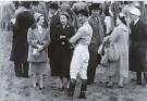 Dick in the parade ring before the 1956 Grand National with HM The Queen, HM The Queen Mother, HRH Princess Margaret and trainer Peter Cazalet.